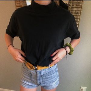 Black mock neck tee shirt